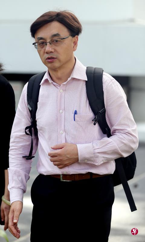 南大电子工程系副教授王建良因一起公路纠纷被控三项罪状.(海峡时报)